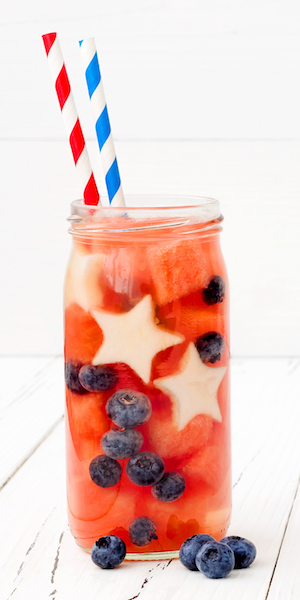 Watermelon, Blueberry Water in a glass with 2 straws