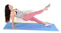 Reverse Plank with Leg Lift exercise being done by trainer Christina Carlyle