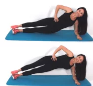 Trainer Christina Carlyle doing a hip plank pulse exercise
