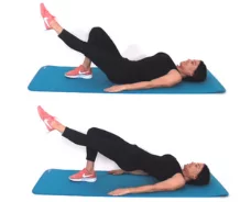 Trainer Christina Carlyle doing a single leg bridge saddlebag exercise