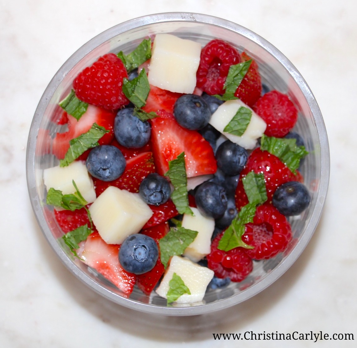 Healthy 4th of July Recipes - Red, White and Blue Berries and Hearts of Palm Salad from nutritionist Christina Carlyle. Nutritious, Delicious, and Easy Healthy 4th of July Recipes you can enjoy guilt-free. These delicious, Healthy 4th of July Recipes are high in nutrients and fiber but low in calories, fat, and sugar. https://www.christinacarlyle.com/healthy-4th-of-july-recipes