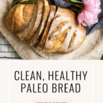 a loaf of bread on a cutting board on a counter and text that says Clean Healthy Paleo Bread