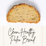 a loaf of bread on a cutting board on a counter and text that says Clean Healthy Paleo Bread