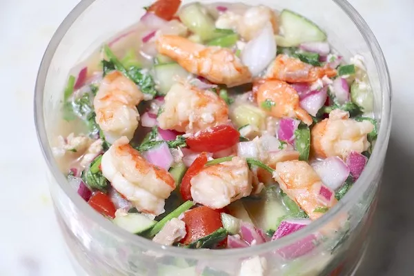 Healthy Shrimp Ceviche in a glass bowl on a kitchen counter