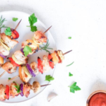 Kabobs on a plate on a kitchen counter and text that says healthy kabob recipe