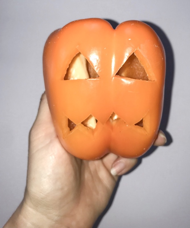Hollow Bell Pepper Shell Carved with a pumpkin face