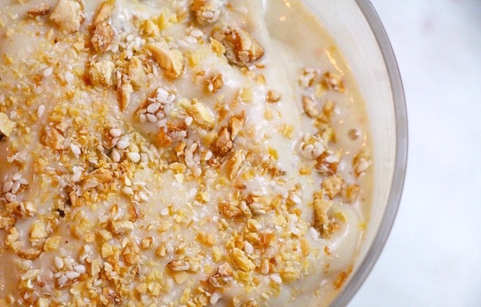 Nice cream in a bowl with toasted crushed almonds