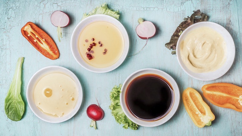 Healthy Dipping Sauces and Salad Dressings for Game Day Snacks on a countertop