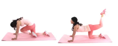 Christina Carlyle - knee tuck extension ab exercise Christina Carlyle doing a knee tuck extension ab exercise
