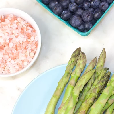 Blueberries, Pink Salt, and Asparagus flatlay