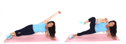 Christina Carlyle doing a side plank tuck crunch ab exercise at home