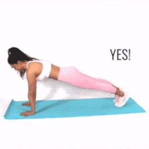 Trainer Christina Carlyle demonstrating the right and wrong way to do a plank exercise