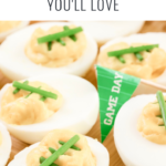 a platter of deviled eggs decorated like footballs and text that says 30 HEALTHY GAME DAY FOOD IDEAS & RECIPES YOU'LL LOVE