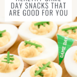 deviled eggs decorated like footballs and text that says Healthy Football Food That's Good For You