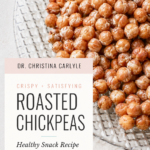 Pinterest pin from Dr. Christina Carlyle featuring crispy roasted chickpeas on a glass plate with text that says “Roasted Chickpeas Healthy Snack Recipe,” highlighting an easy high-fiber, protein-packed snack recipe.