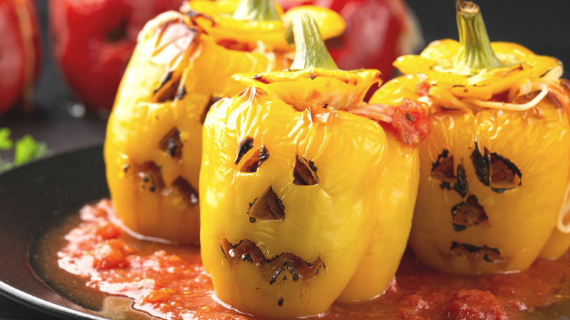 Stuffed Bell Peppers with Jack O Lantern faces Halloween food Ideas