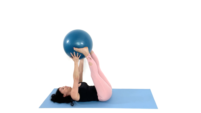 Christina Carlyle doing a stability ball exercises