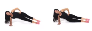 Christina Carlyle doing a Side Plank Pulse Deep Core Exercise