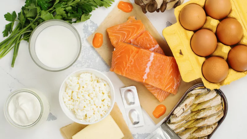 a flatlay of foods highest in Vitamin D