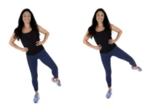 trainer Christina Carlyle doing a hip dip pulse glute exercise