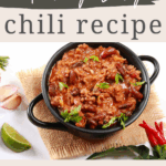 Pinterest graphic for Dr. Christina Carlyle’s Healthy Easy Chili Recipe featuring a black bowl of chili with beans and fresh herbs and text overlay reading “Healthy, Easy Chili Recipe – Get the Recipe at ChristinaCarlyle.com.”