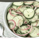sliced Cucumbers and red onion cucumber Salad and text that says Quick, Easy, Delicious Cucumber Salad Recipe