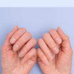 Hands showing natural nails with text overlay ‘Nails & Health’ from Dr. Christina Carlyle, highlighting how nail appearance reflects overall wellness and nutrient status.