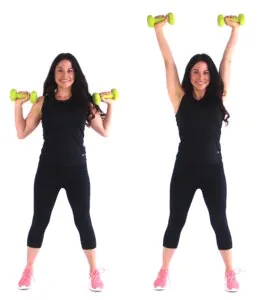 Dr. Christina Carlyle demonstrating a dumbbell overhead press from shoulders to overhead