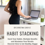 Dr Christina Carlyle walking on a treadmill desk while working on a laptop in a bright home office, demonstrating habit stacking for busy women to get healthy, productive, and fit without finding more time.