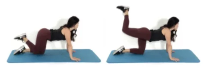 Dr. Christina Carlyle demonstrates a donkey kick exercise on a yoga mat, lifting one bent leg toward the ceiling to target the glutes and hamstrings.